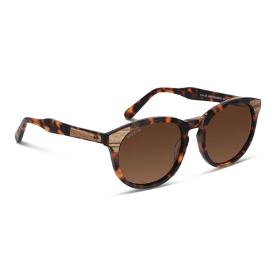 lentes de sol polarizados para hombre y mujerovalados de color carey con patas de madera natural sustentable. Marco de plastico reciclado con lentes polarizadas