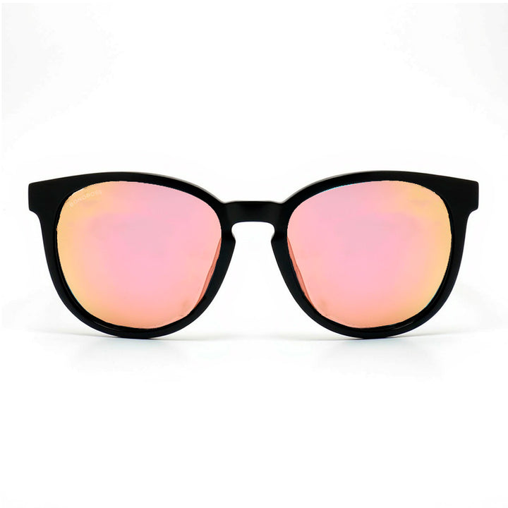 anteojos redondos de plástico reciclado y varillas de madera natural sustentable con lentes de color negro. Polarizadas y forma redonda.   #color_espejado-rosado