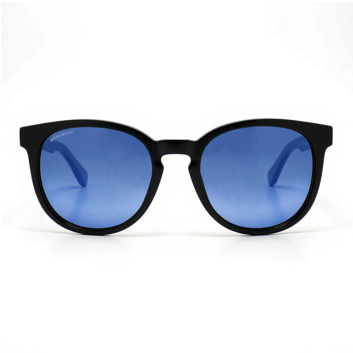 anteojos redondos de plástico reciclado y varillas de madera natural sustentable con lentes de color degradé azul. Polarizadas y forma redonda.  #color_degrade-azul