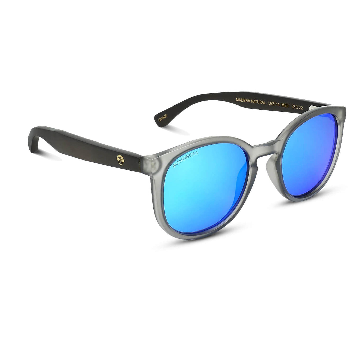 anteojos redondos de plástico reciclado y varillas de madera natural sustentable con lentes de color espejado azul. Polarizadas y forma redonda. La gafa es color transparente