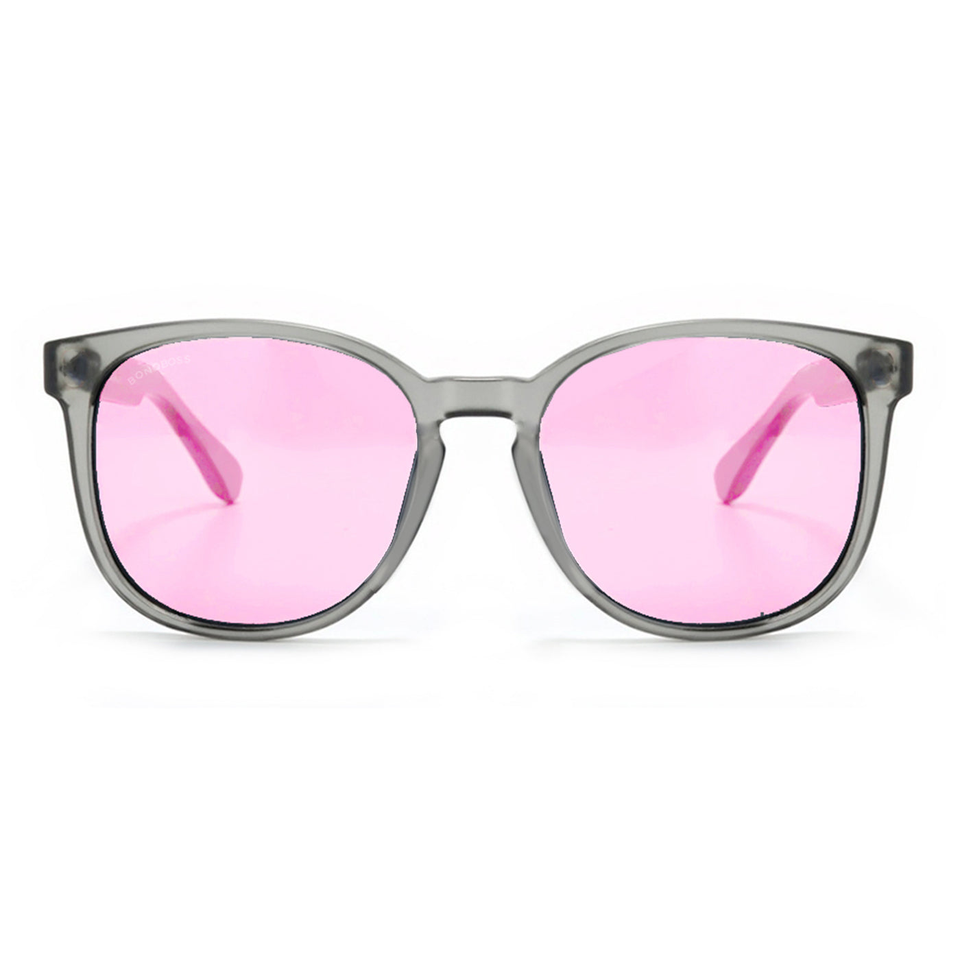 anteojos redondos de plástico reciclado y varillas de madera natural sustentable con lentes de color rosado. Polarizadas y forma redonda. La gafa es color transparente