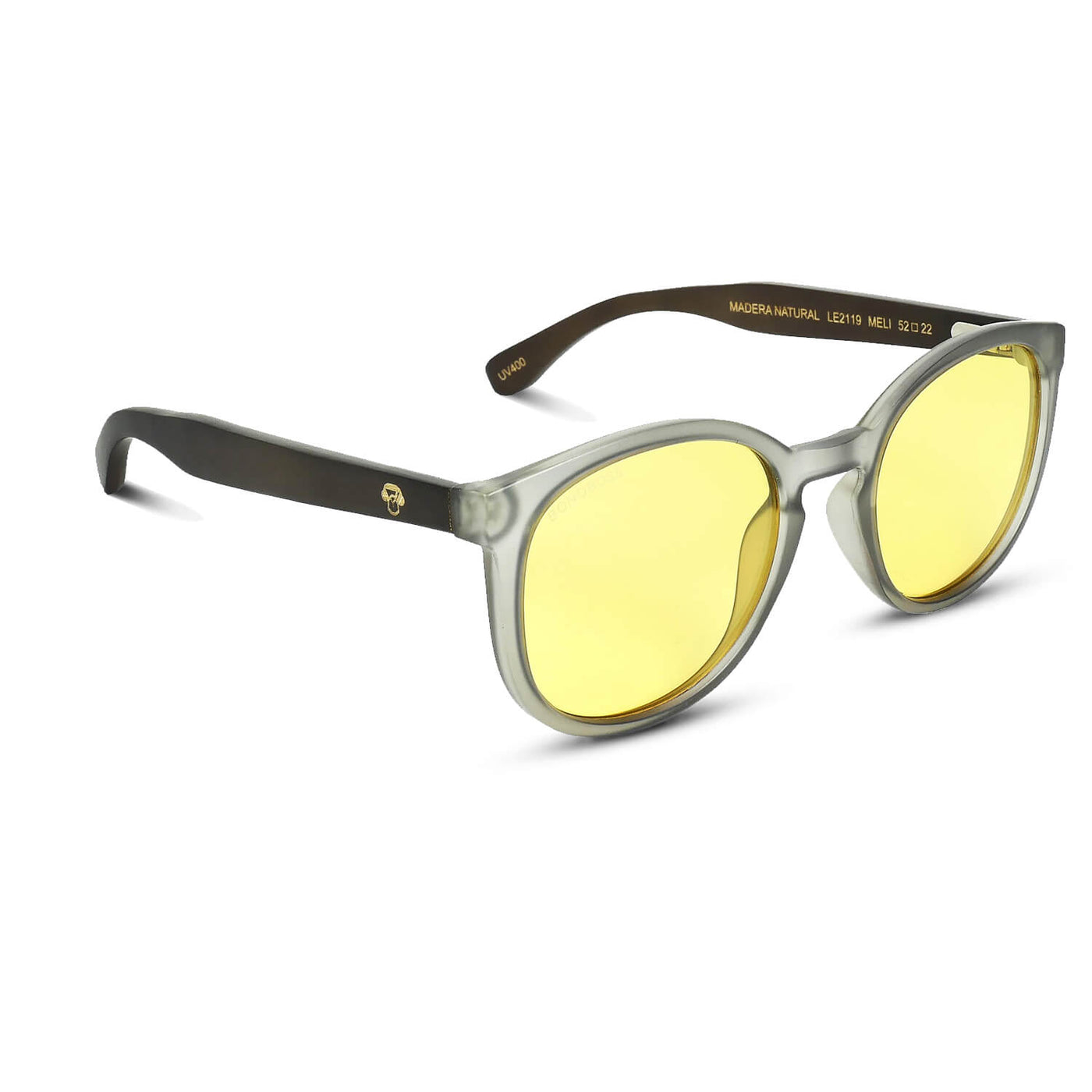 anteojos redondos de plástico reciclado y varillas de madera natural sustentable con lentes de color amarillo. Polarizadas y forma redonda. La gafa es color transparente