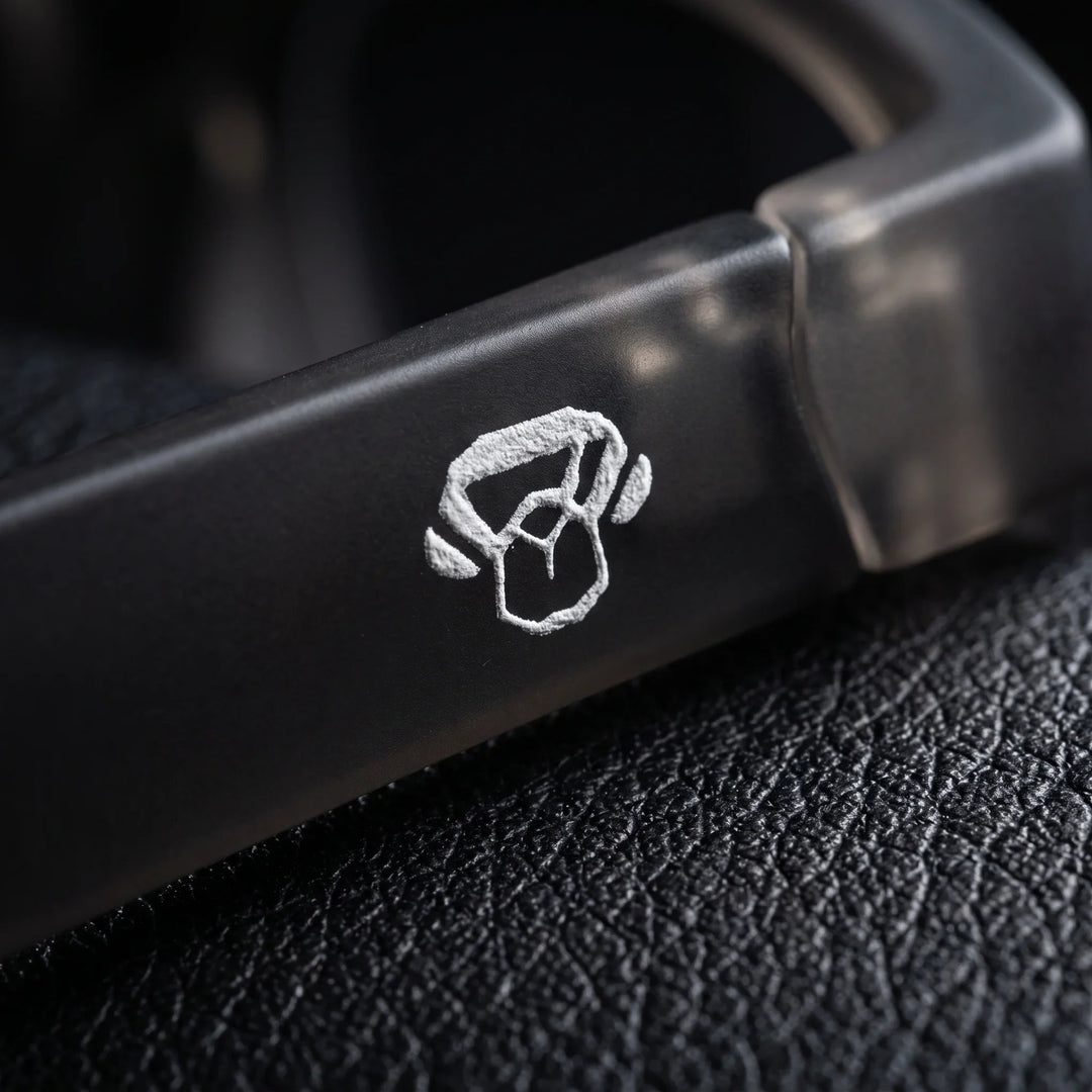 Lentes ópticos deportivos Bonoboss Lewis Champagne detalle logo emblema #color_champagne