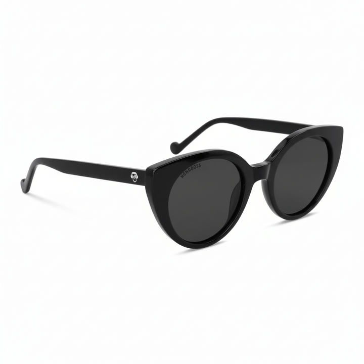 vista lateral de unos anteojos de sol gafa polarizada de forma agatada retro para hombre y mujer de cara redonda grande #color_negro