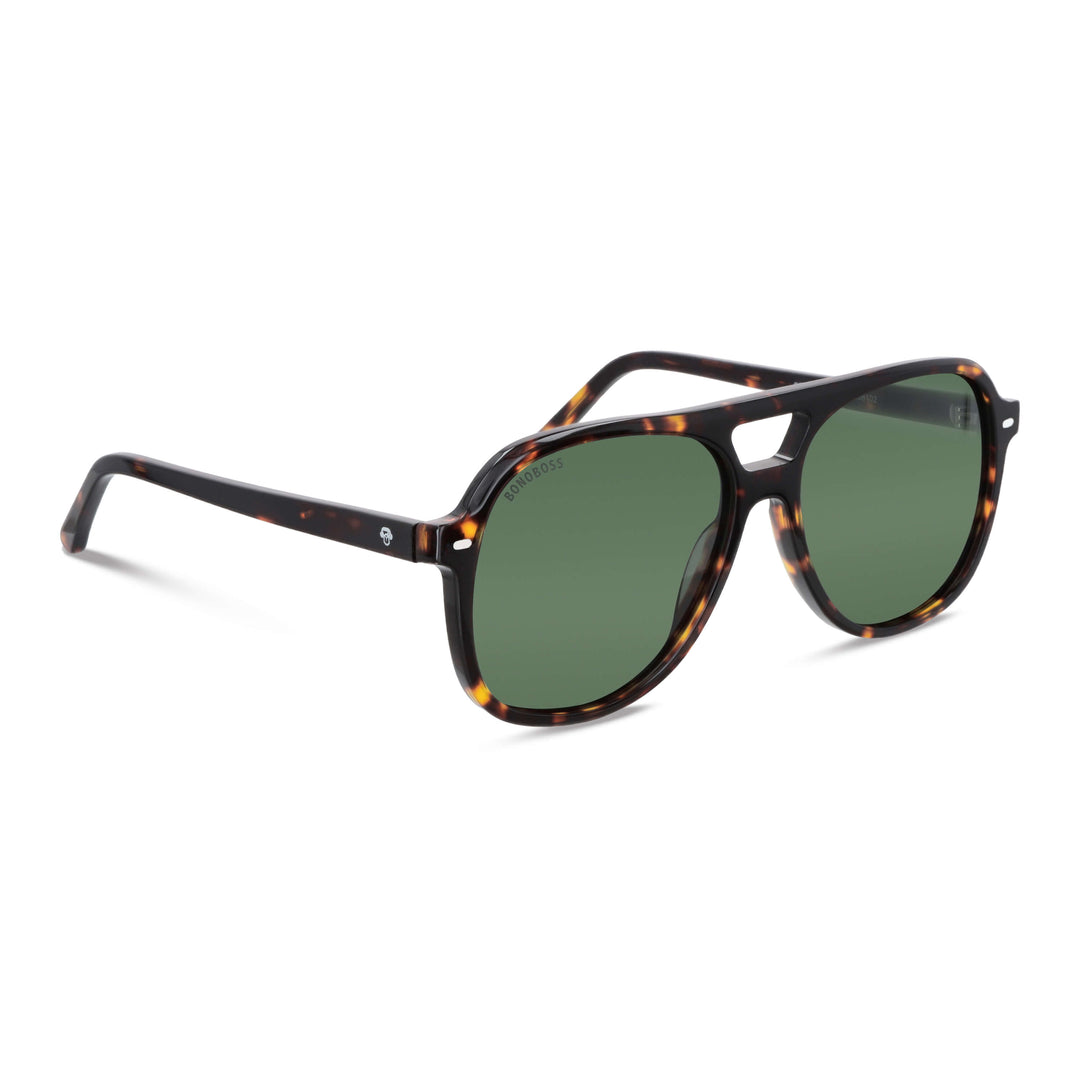 vista lateral de unos anteojos de sol oversized de color carey con lentes verdes g15 forma aviador clasica de moda para hombre y mujer #color_carey