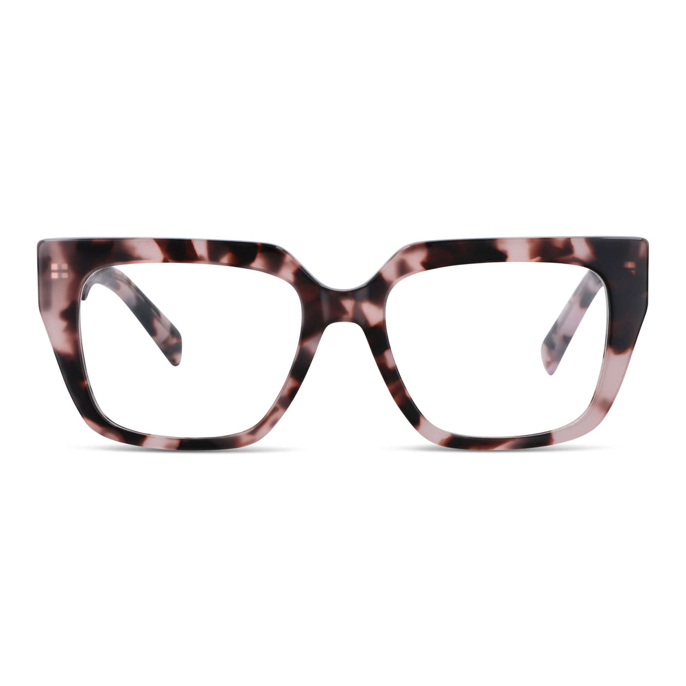 una modelo mujer de cara ovalada ojos cafe y pelo tomado usando un anteojo o marco optico Bonoboss en acetato sustentable armazones opticos con receta de forma cuadrada rectangular de moda de tamaño grande y de color carey jaspeado #color_carey