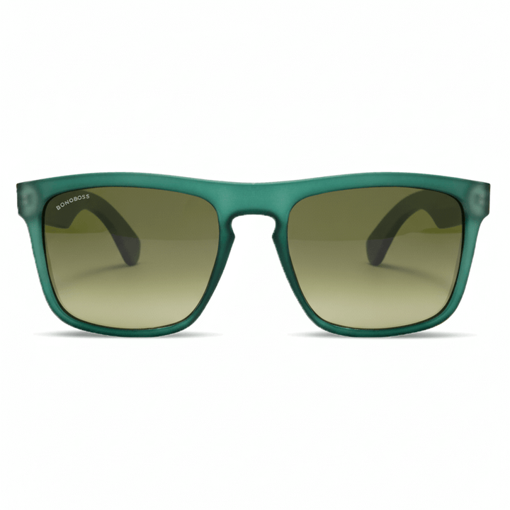 una vista frontal de anteojos gafas de sol rectangulares ecologicas de plastico reciclado especial para regalo corporativo personalizado de color verde blanco con lentes degrade verde en vista frontal #color-marco_forest