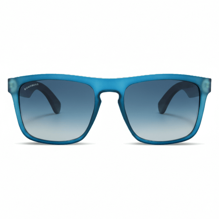 una vista frontal de anteojos gafas de sol rectangulares ecologicas de plastico reciclado especial para regalo corporativo personalizado de color azul ocean con lentes degrade azules en vista frontal #color-marco_ocean