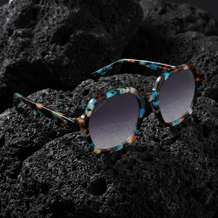 Lentes sol Canarias polarizados UV400 sobre roca volcanica textura natural Bonoboss #color_azul