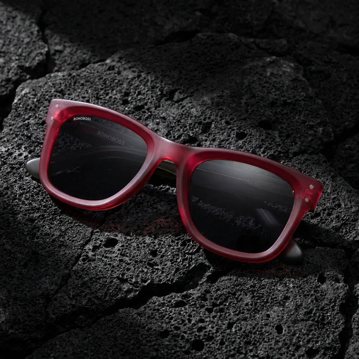 Lentes sol Acacia Reverse polarizados UV400 sobre roca volcanica textura natural Bonoboss #color_rosado