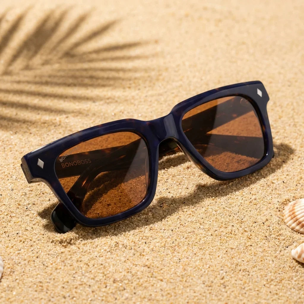Lentes sol Bruno polarizados UV400 sobre arena dorada costa textura natural Bonoboss #color_carey