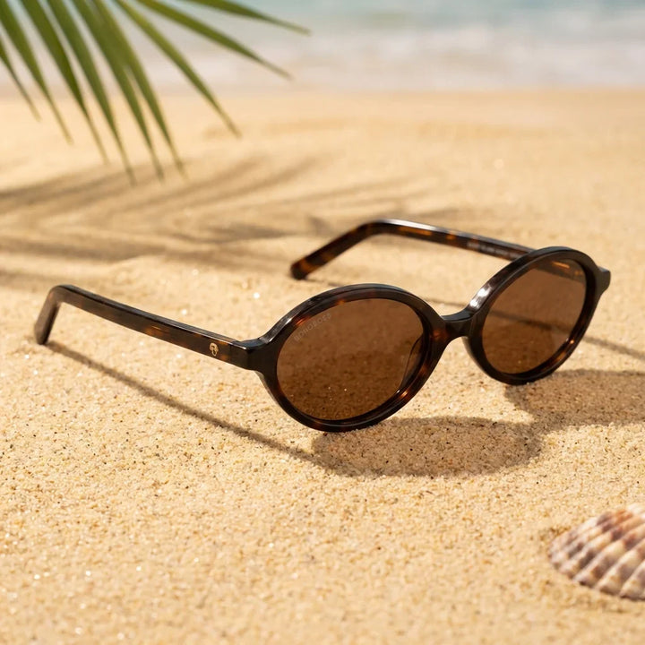Lentes sol Guapi Island polarizados UV400 sobre arena dorada costa textura natural Bonoboss #color_carey
