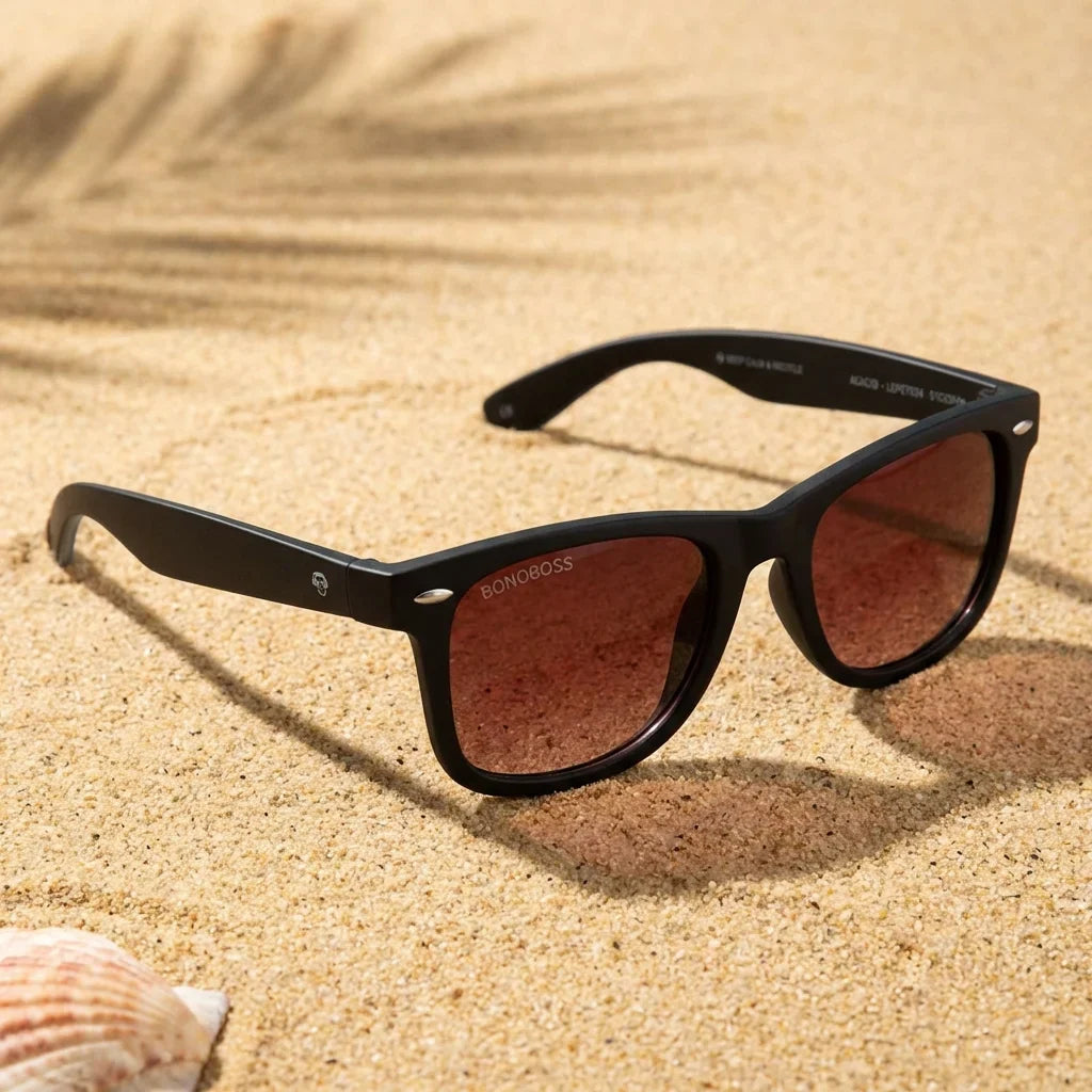 Lentes sol Acacio RPET polarizados UV400 sobre arena dorada costa textura natural Bonoboss #color_rojo
