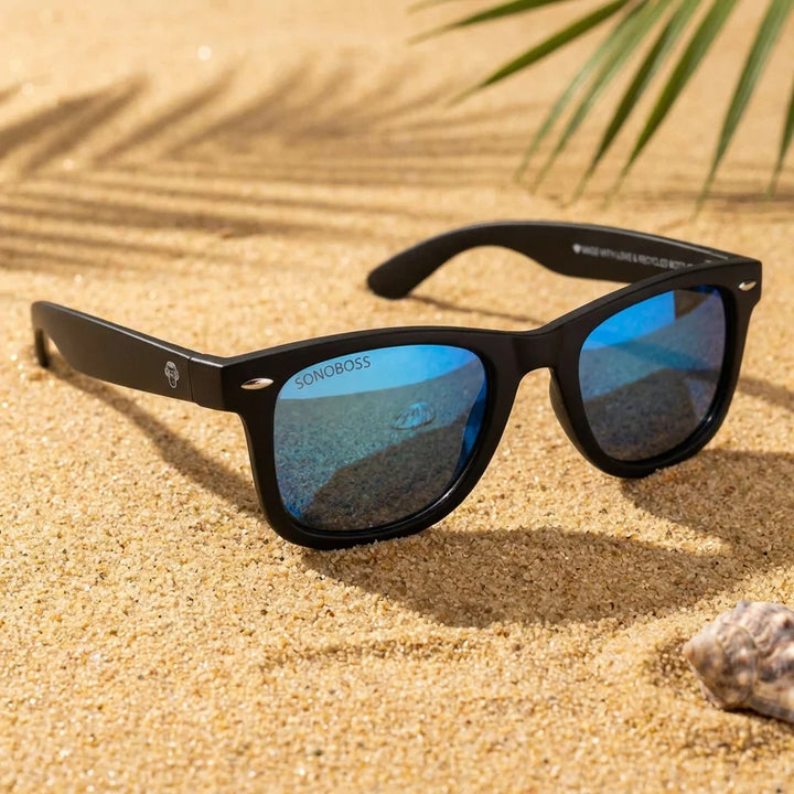 Lentes sol Acacio RPET polarizados UV400 sobre arena dorada costa textura natural Bonoboss #color_sky