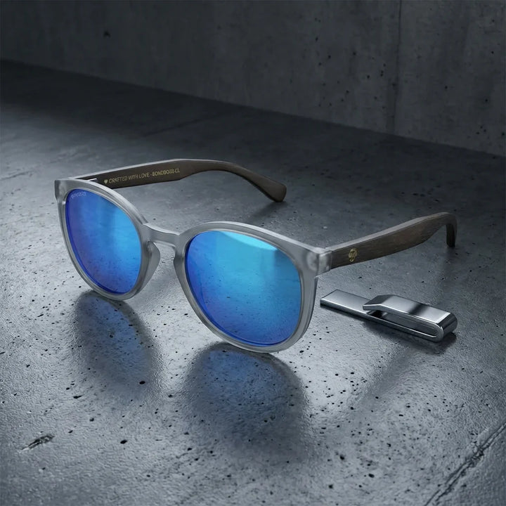Lentes sol Meli TSP polarizados UV400 sobre concreto urbano textura industrial Bonoboss #color_espejado-azul