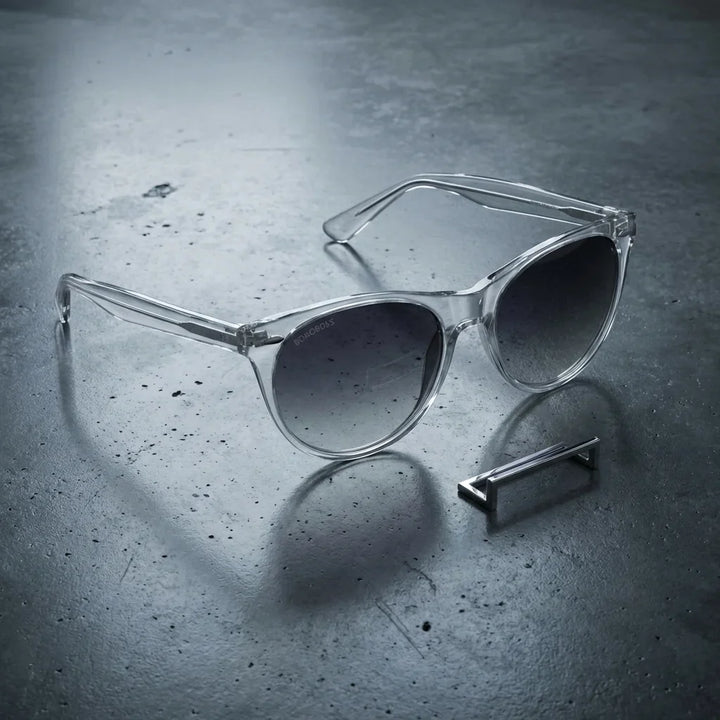 Lentes sol Hanga Roa polarizados UV400 sobre concreto urbano textura industrial Bonoboss #color_transparente