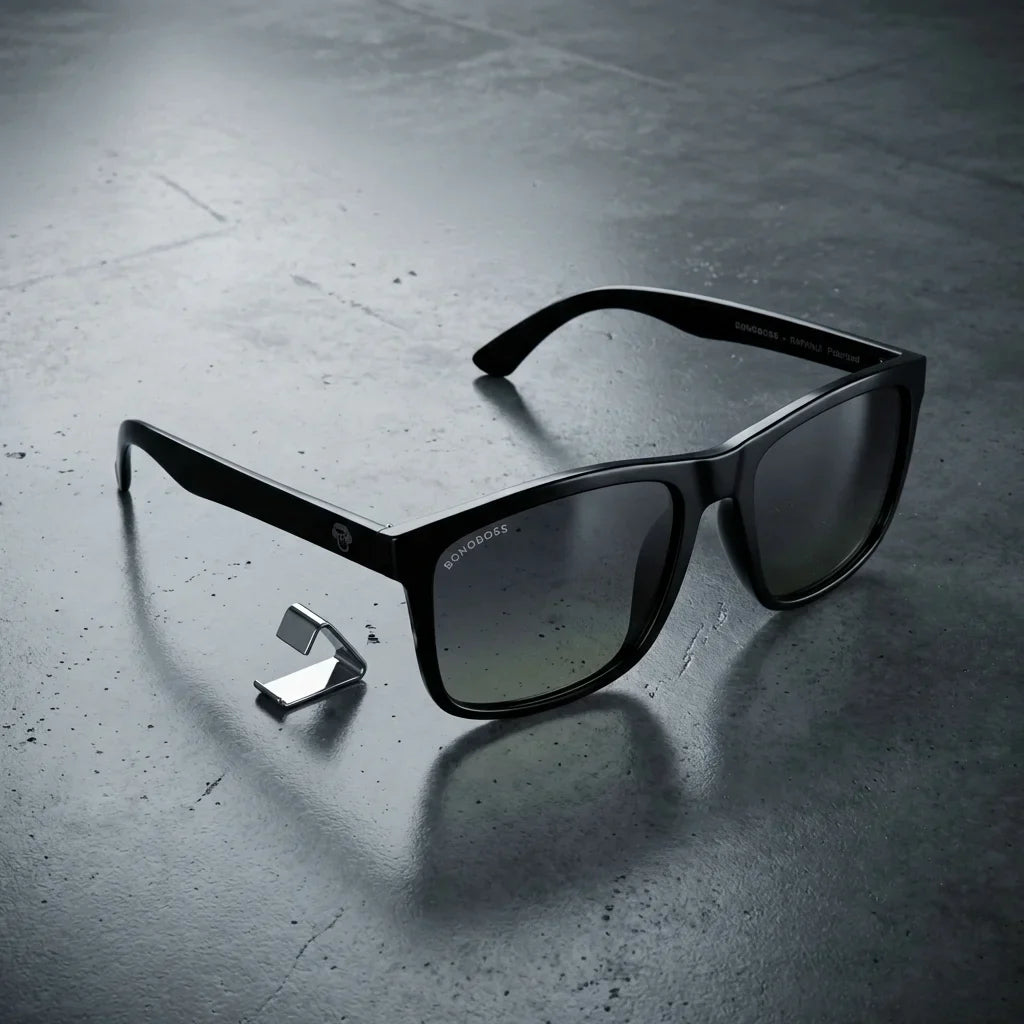 Lentes sol Rapanui RPET polarizados UV400 RPET reciclado black sobre concreto urbano textura industrial Bonoboss #editorial_grid1 #color_black