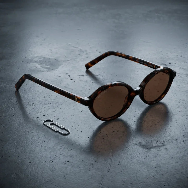 Lentes sol Guapi Island polarizados UV400 sobre concreto urbano textura industrial Bonoboss #color_carey