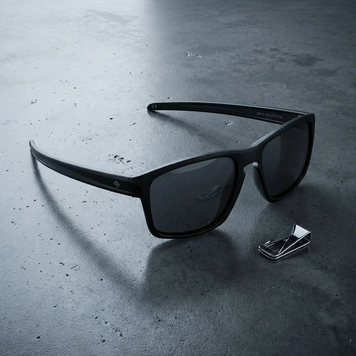 Lentes sol Lautaro RPET polarizados UV400 sobre concreto urbano textura industrial Bonoboss #color_negro