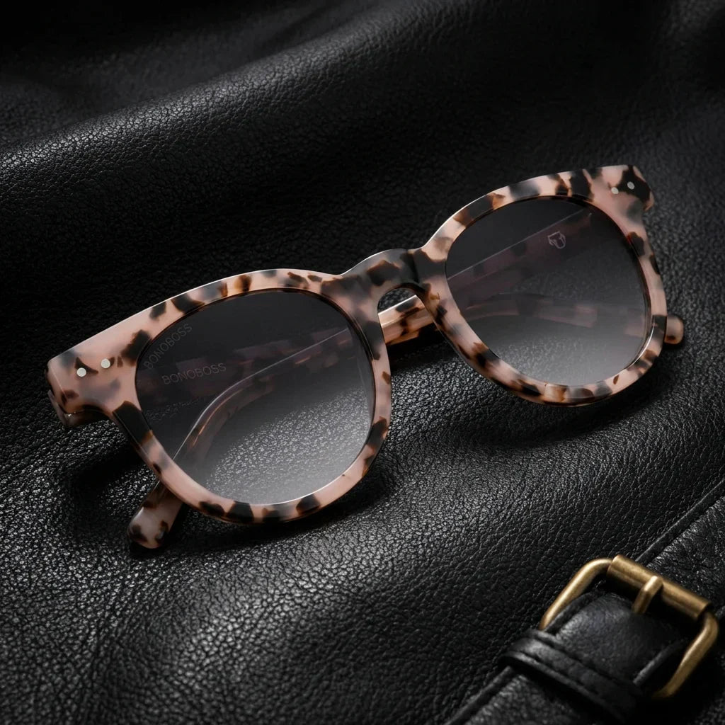 Lentes sol Meli polarizados UV400 bio-acetato marble sobre cuero negro brass detalle premium contraste Bonoboss #editorial_grid1 #color_marble