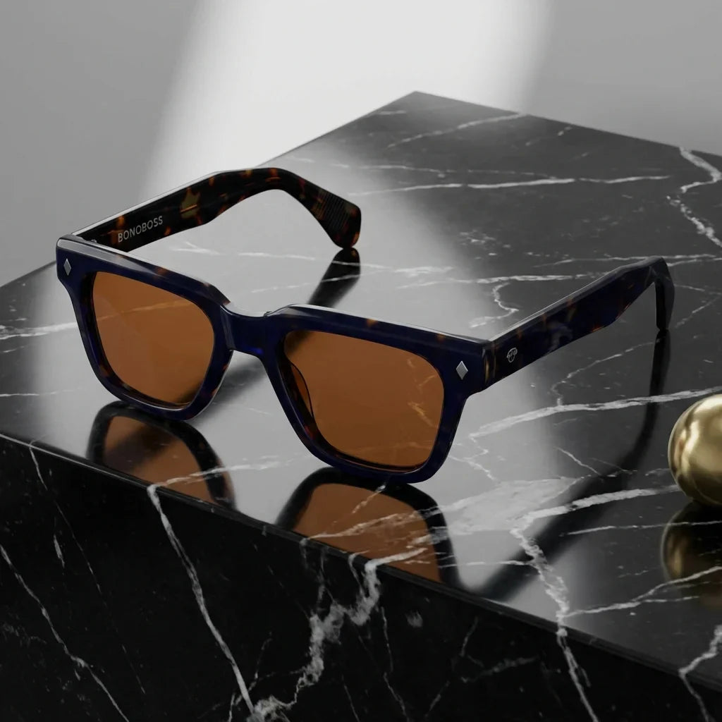 Lentes sol Bruno polarizados UV400 sobre marmol negro superficie elegante Bonoboss #color_carey