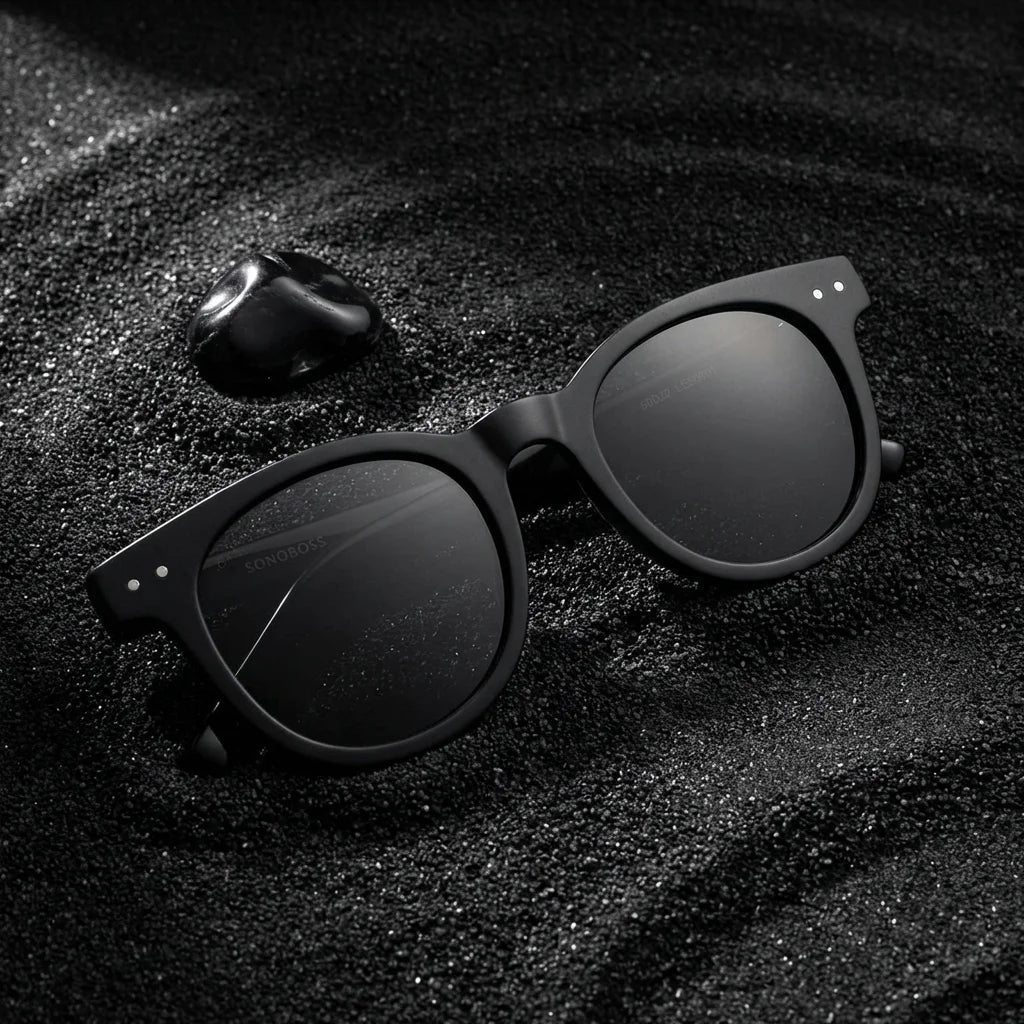 Lentes sol Meli polarizados UV400 sobre arena negra volcanica Bonoboss #color_negro