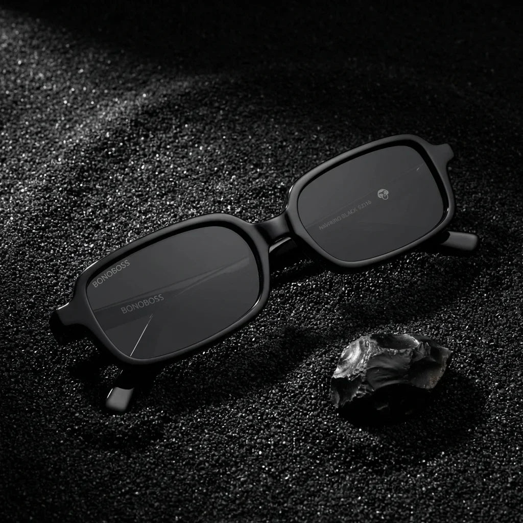 Lentes sol Navarino polarizados UV400 sobre arena negra volcanica Bonoboss #color_negro