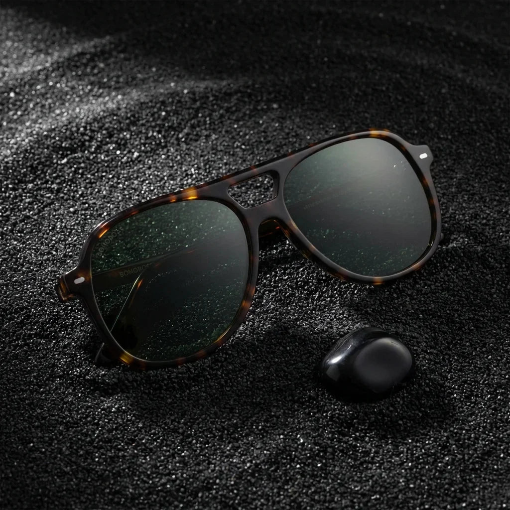 Lentes sol Orson E.D polarizados UV400 sobre arena negra volcanica Bonoboss #color_carey
