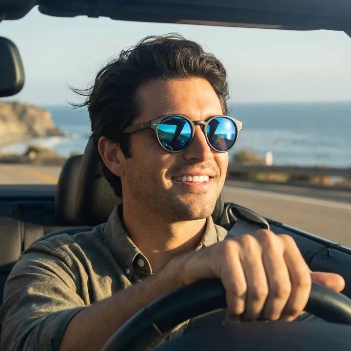 Hombre usando lentes sol Joplin RPET RPET reciclado del oceano polarizados espejado azul conduciendo proteccion solar UV400 carretera Bonoboss #editorial_banner #color_espejado-azul