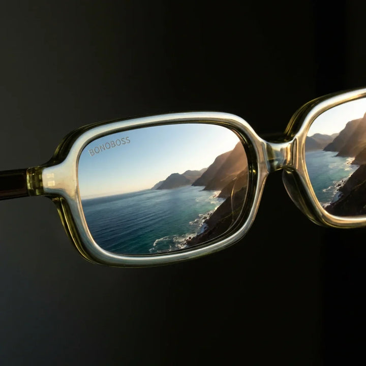 Lentes sol Navarino polarizados UV400 bio-acetato verde close-up lente reflejo paisaje costero infinito Bonoboss #editorial_polarizado #color_verde