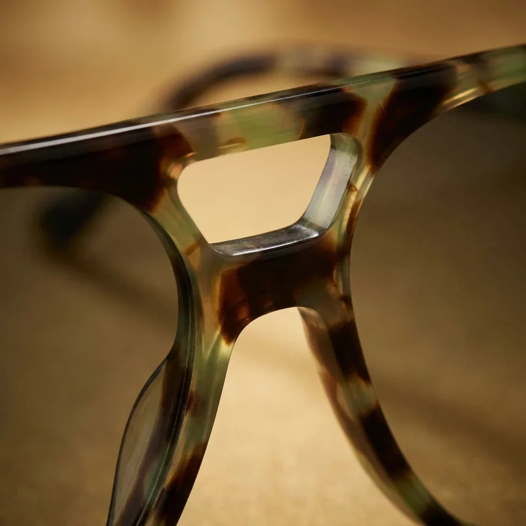 Lentes sol Orson E.D polarizados UV400 bio-acetato verde close-up acetato textura vetas detalle material premium Bonoboss #editorial_grid1 #color_verde