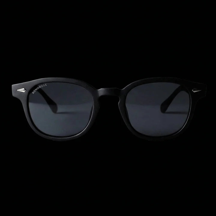 Lentes sol Waimea RPET polarizados UV400 frontal dramatico luz editorial Bonoboss #color_negro
