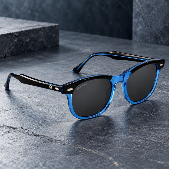 Lentes de sol polarizados Algarrobo Azul lente Gris bodegón sobre piedra oscura Bonoboss #editorial_polarizado #color_azul