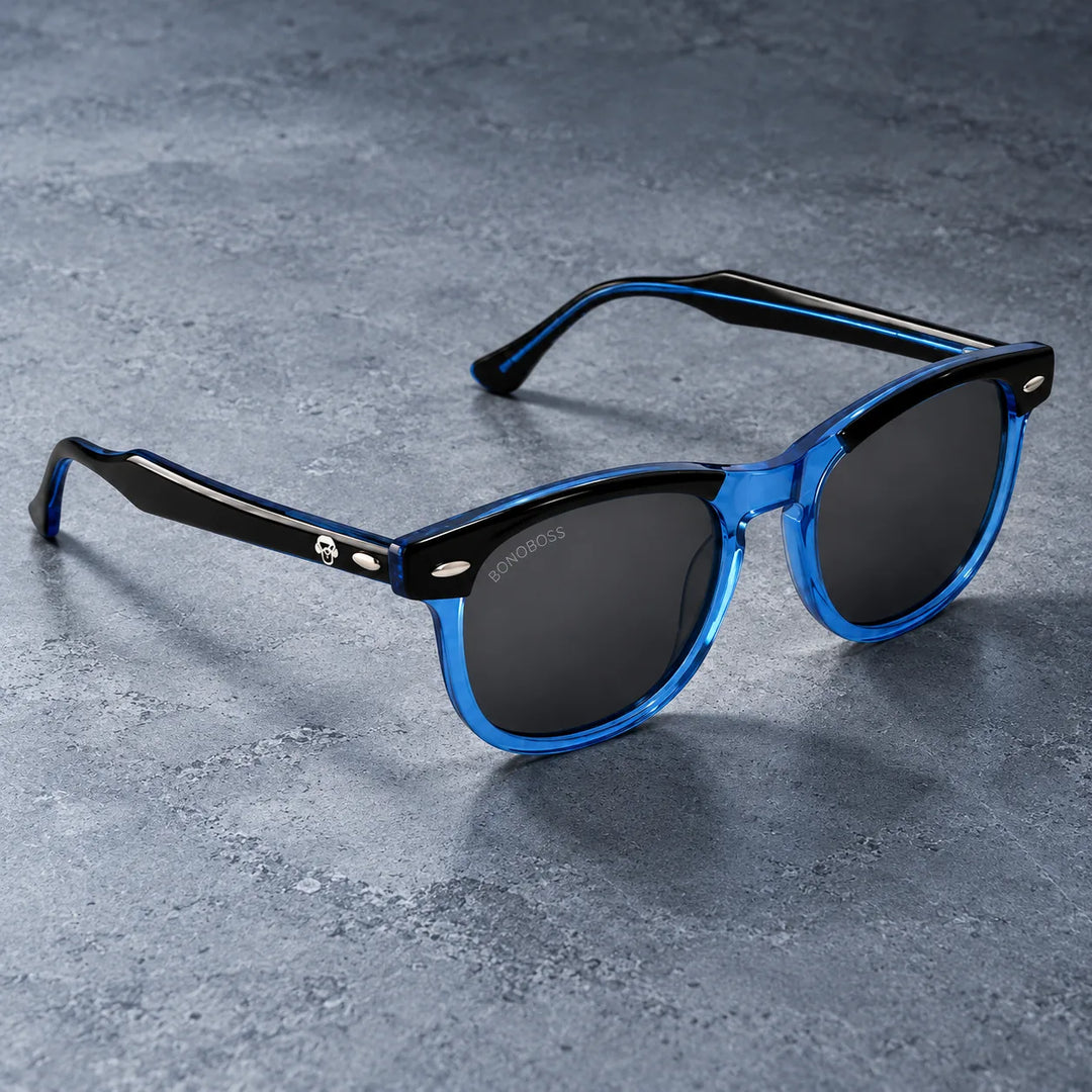 Lentes de sol polarizados Algarrobo Azul lente Gris bodegón sobre piedra gris Bonoboss #editorial_grid1 #color_azul