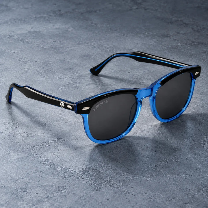 Lentes de sol polarizados Algarrobo Azul lente Gris bodegón sobre piedra gris Bonoboss #editorial_grid1 #color_azul