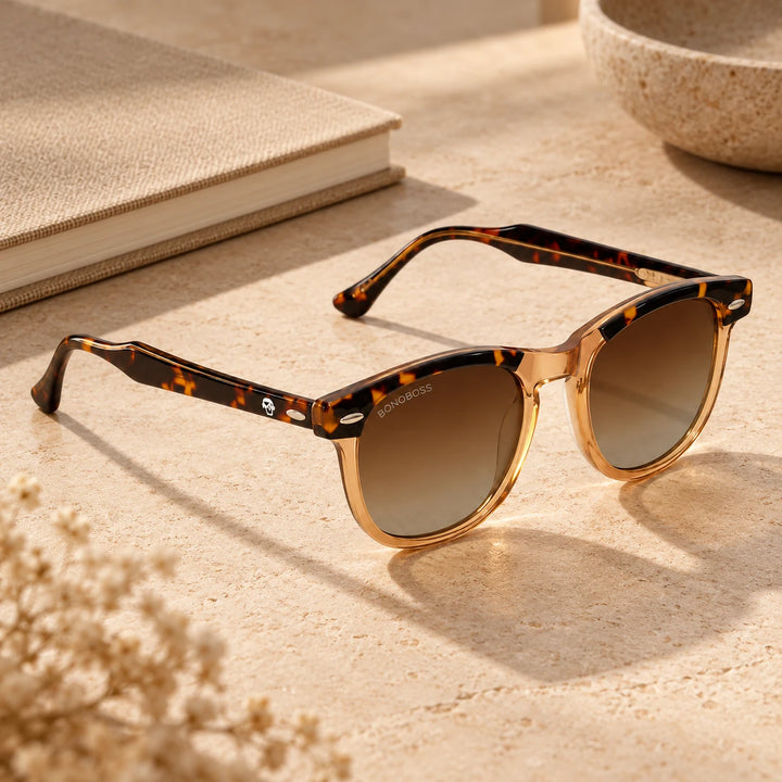 Lentes de sol polarizados Algarrobo Carey Nude lente Degradé Café bodegón sobre travertino con flores secas Bonoboss #editorial_sustentabilidad #color_brown