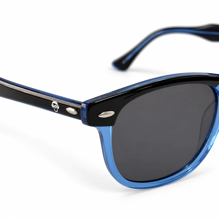 Lentes de sol polarizados Algarrobo Gris y cristal, Lente gris detalle del armazón y logo #editorial_detail1 #color_azul