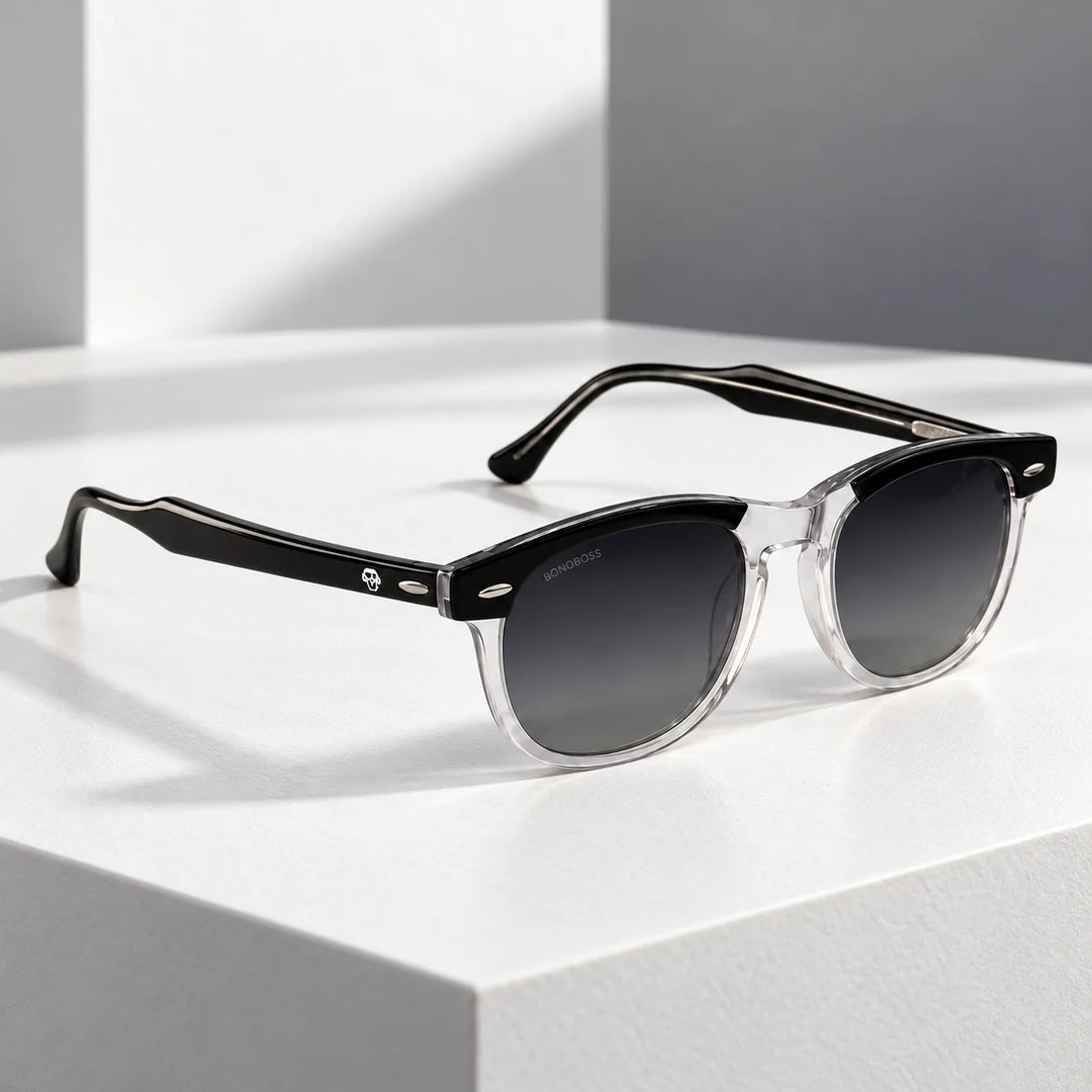 Lentes de sol polarizados Algarrobo Negro Transparente lente Degradé Gris bodegón sobre bloque de piedra blanca Bonoboss #editorial_grid1 #color_transparente