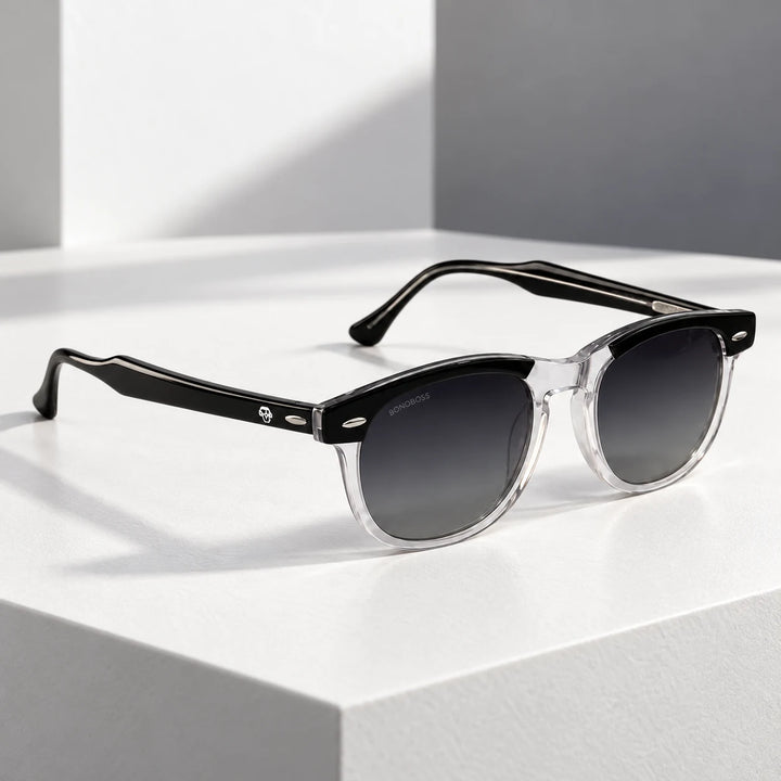 Lentes de sol polarizados Algarrobo Negro Transparente lente Degradé Gris bodegón sobre bloque de piedra blanca Bonoboss #editorial_grid1 #color_transparente