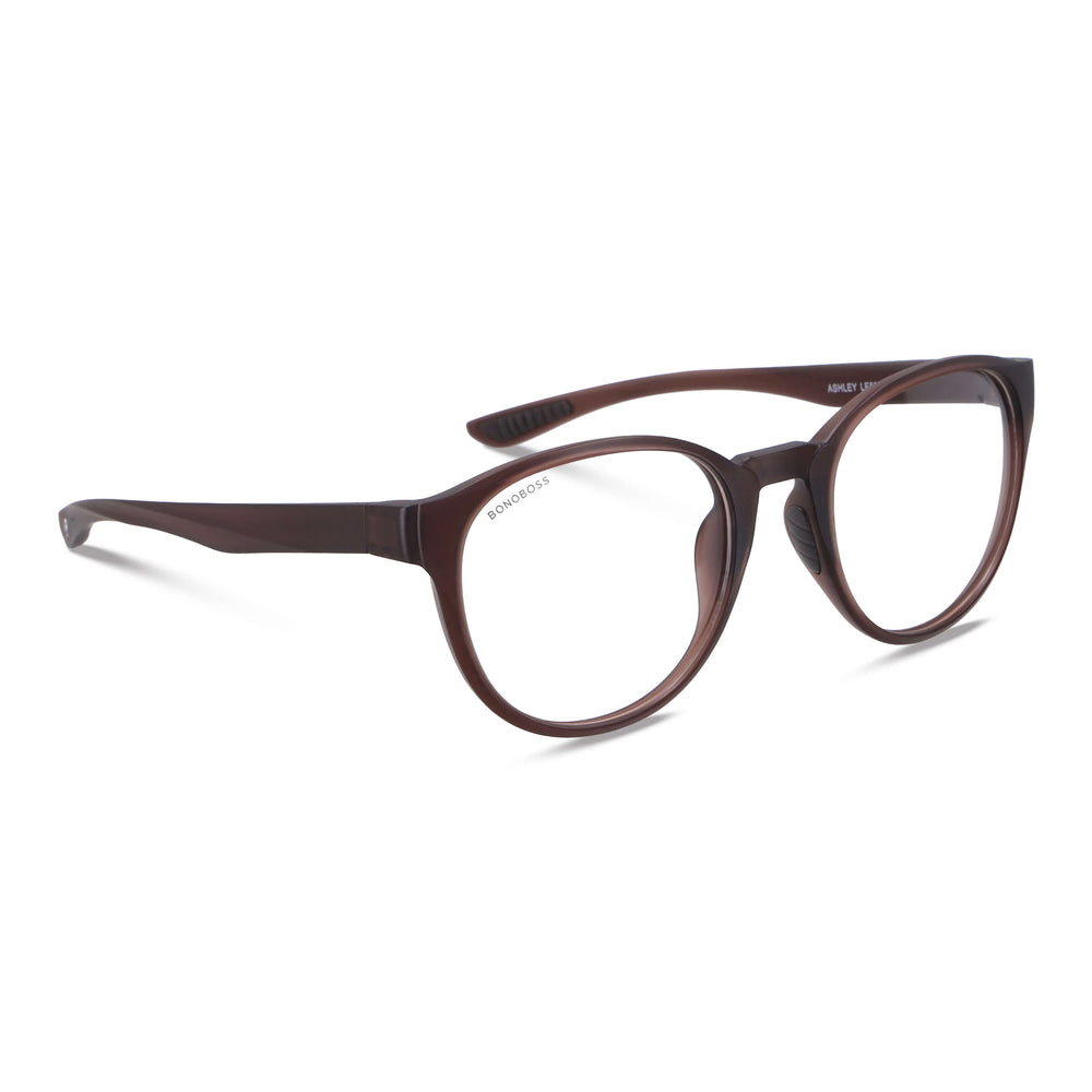 la vista frontal de una mujer de pelo negro suelto usando anteojos marcos opticos con receta de tamaño grande oversized de color duranzo. Bonoboss mayorista y distribuidor de opticas #color_peach