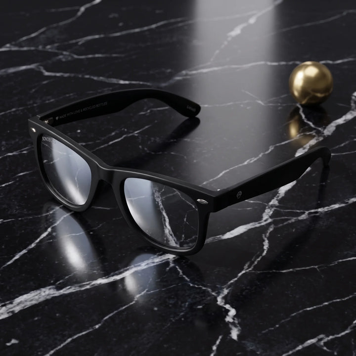 Lentes sol Acacio RPET polarizados UV400 sobre marmol negro superficie elegante Bonoboss #color_espejado-silver