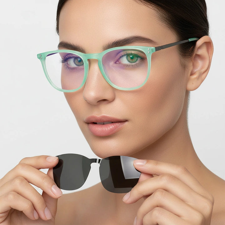 una mujer de cara redonda usando armazones opticos grandes con clip de sol polarizado #color_green