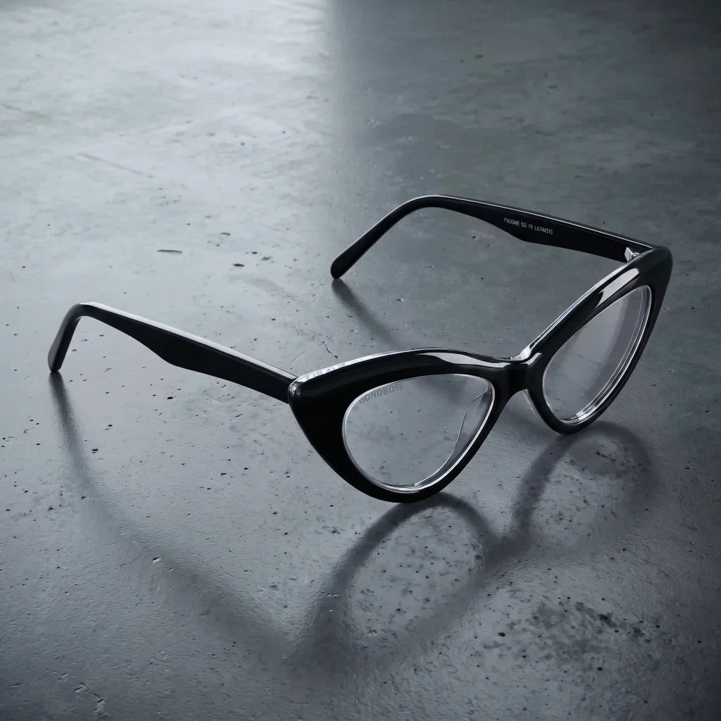 Lentes ópticos Femme Black con filtro de luz azul sobre concreto urbano textura industrial Bonoboss #color_negro
