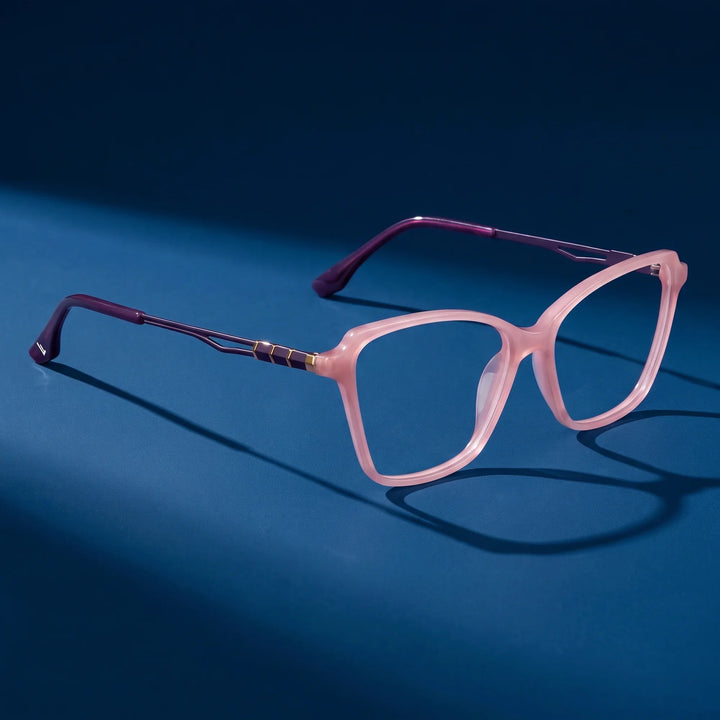 Anteojos Fiore 1006 en rosa – still life on a seamless midnight blue studio backdrop