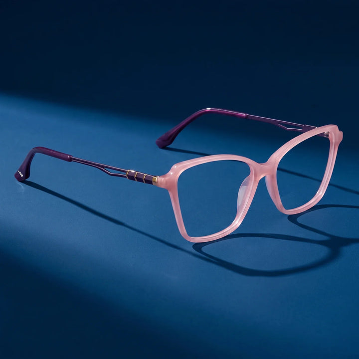 Anteojos Fiore 1006 en rosa – still life on a seamless midnight blue studio backdrop