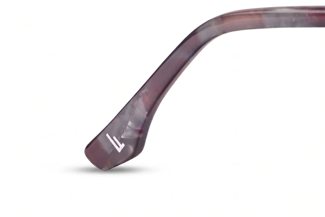Lentes de sol Fiore 1006 Morado – detalle del logo en la patilla #color_gradiente-cafe