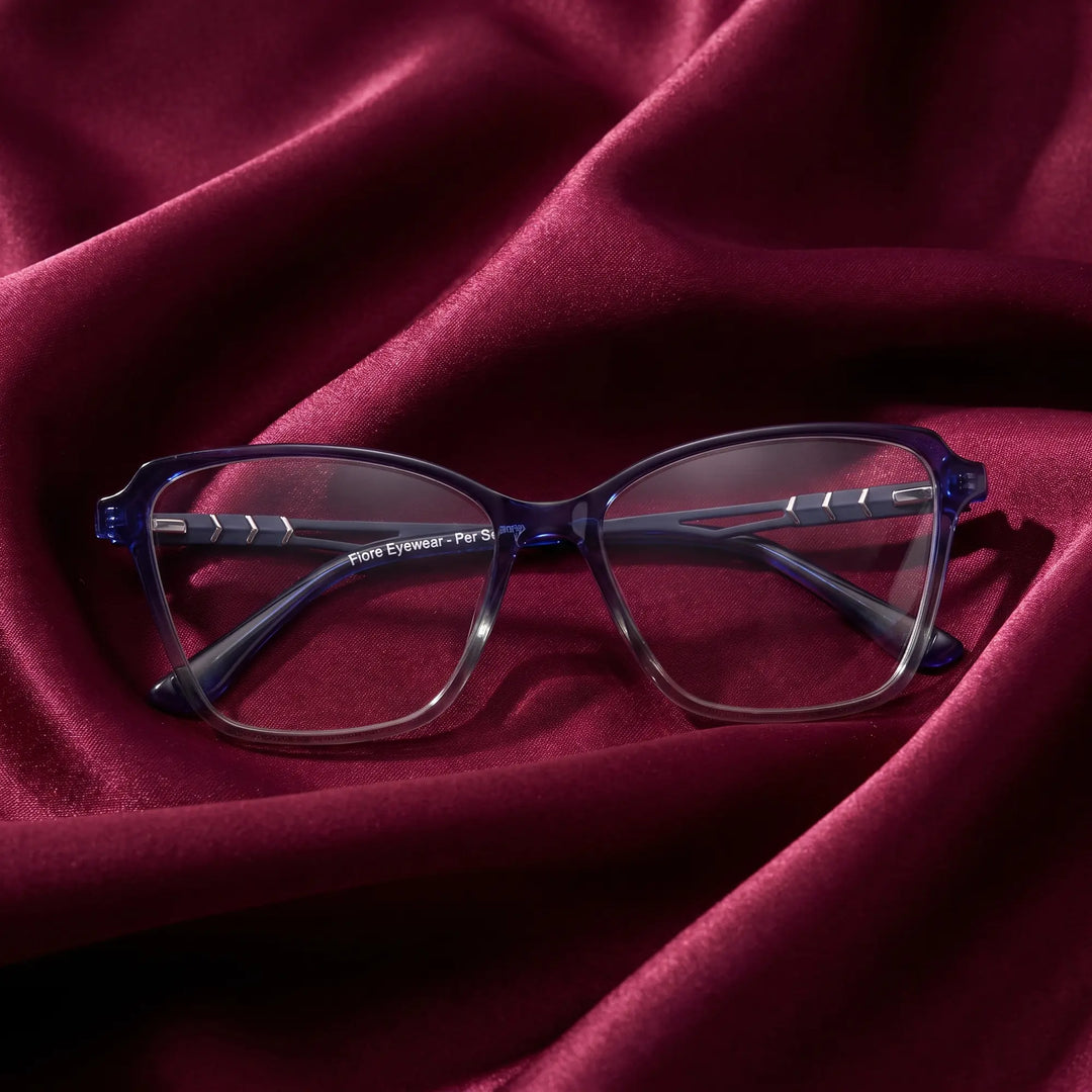 Anteojos Fiore 1006 en azul – nested in flowing burgundy silk