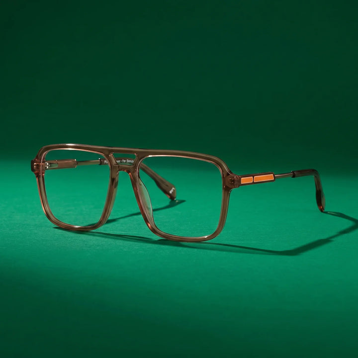 Anteojos Fiore 1014 en café – still life on a seamless emerald studio backdrop