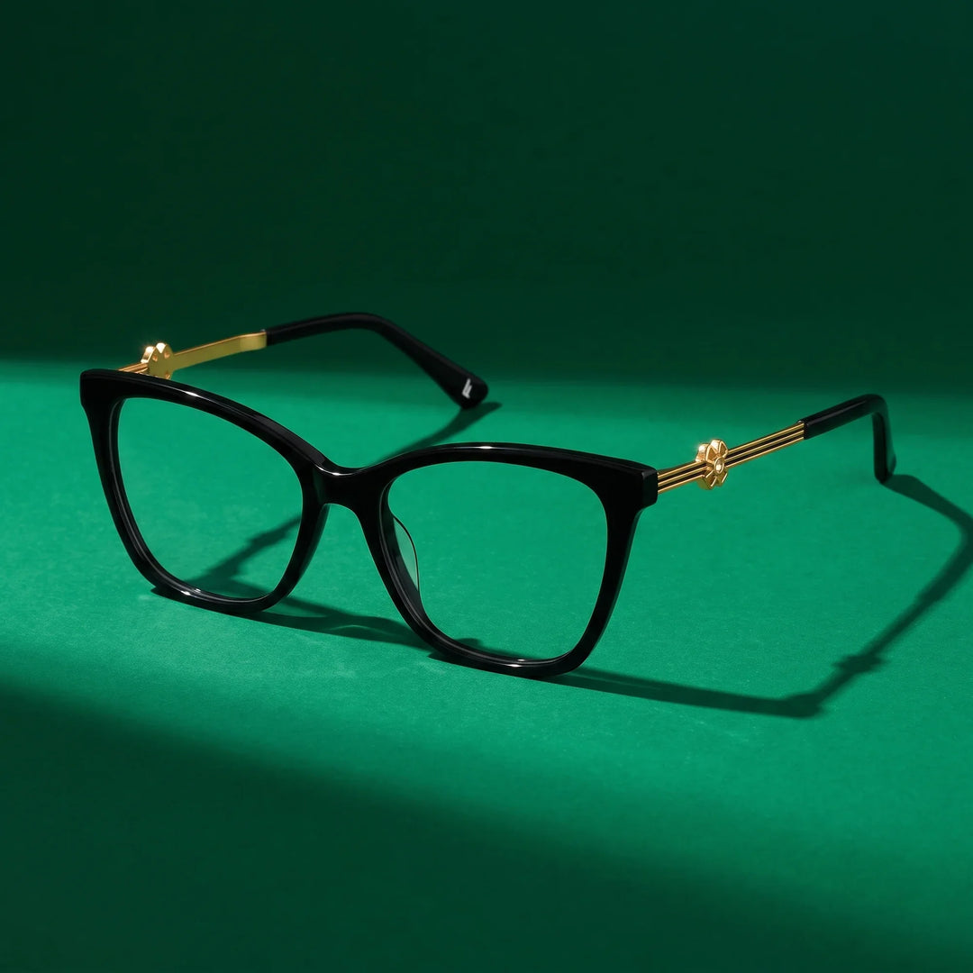 Anteojos Fiore 10172 en negro – still life on a seamless emerald studio backdrop