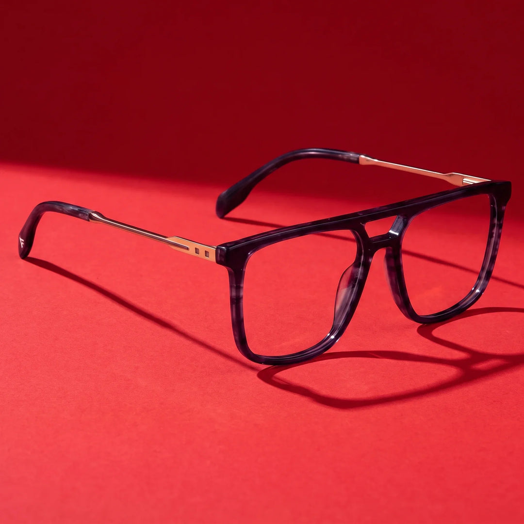Anteojos Fiore 10177 en gris – editorial still life on a saturated vivid red set